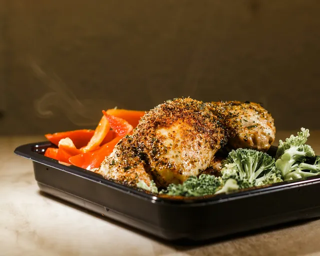 Herb-Roasted Chicken Thighs with Broccoli and Red Peppers